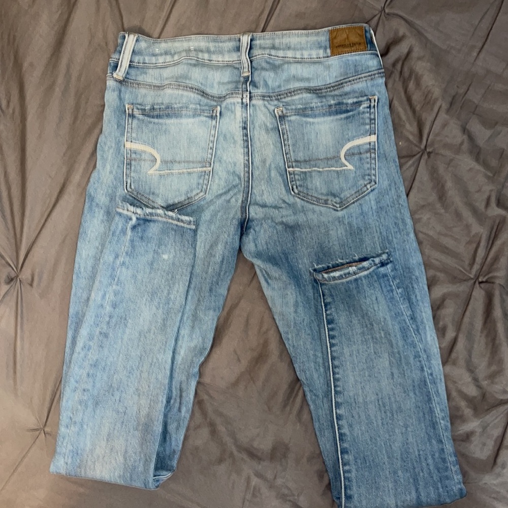 AMERICAN EAGLE “SUPER SUPER STRETCH X” LIGHT WASH JEANS SIZE 10 long